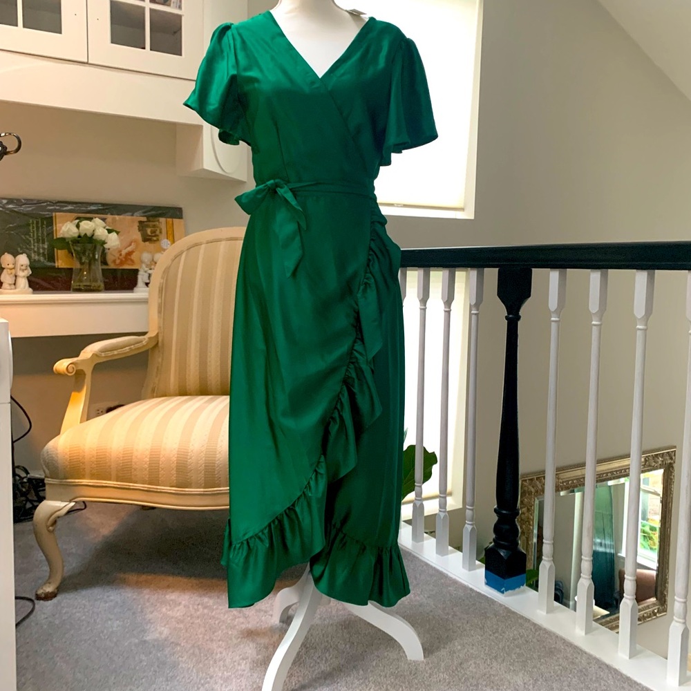 Emerald green, ssize X large, brand new from Francesca, wrap around dress.